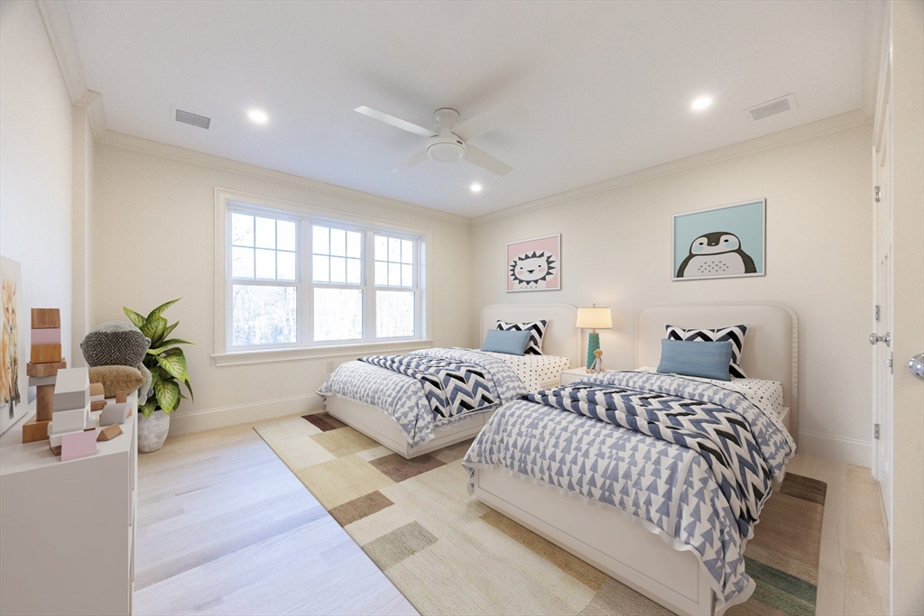 54 Woodland Road Scituate, MA 02066 - Photo 21 of 30 a bedroom with a large bed and a couch