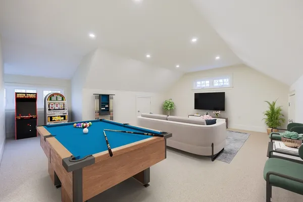 a front view of a house with a yard table and chairs