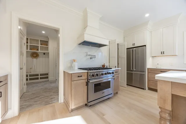 a view of a hallway with windows