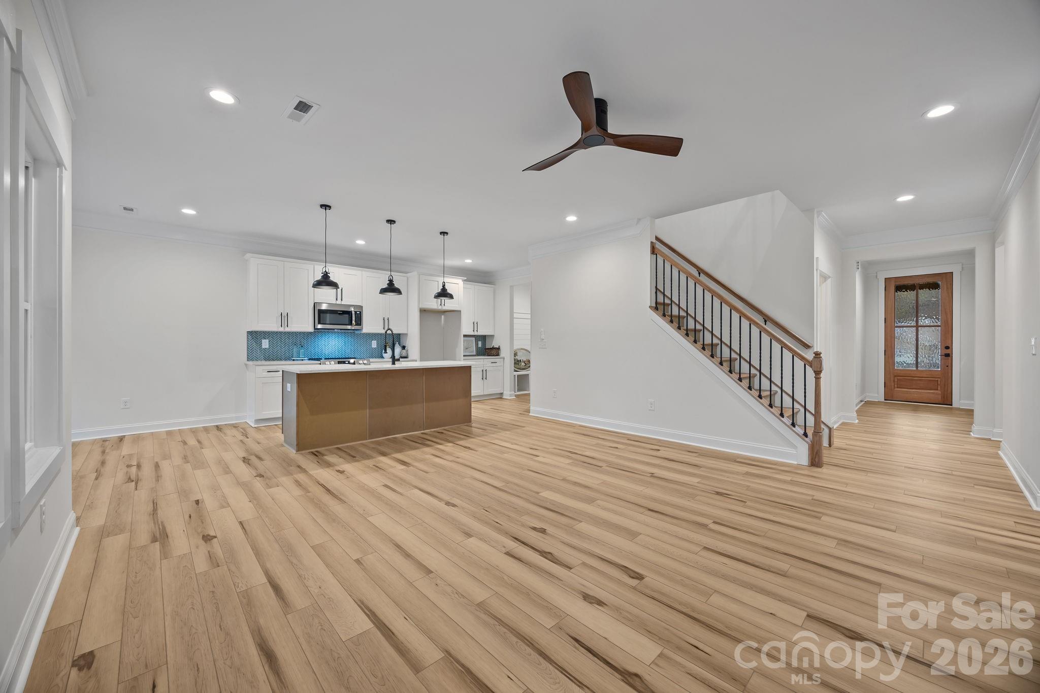 1030 Gibson Road Salisbury, NC 28147 - Photo 12 of 47 a view of kitchen and hall with wooden floor