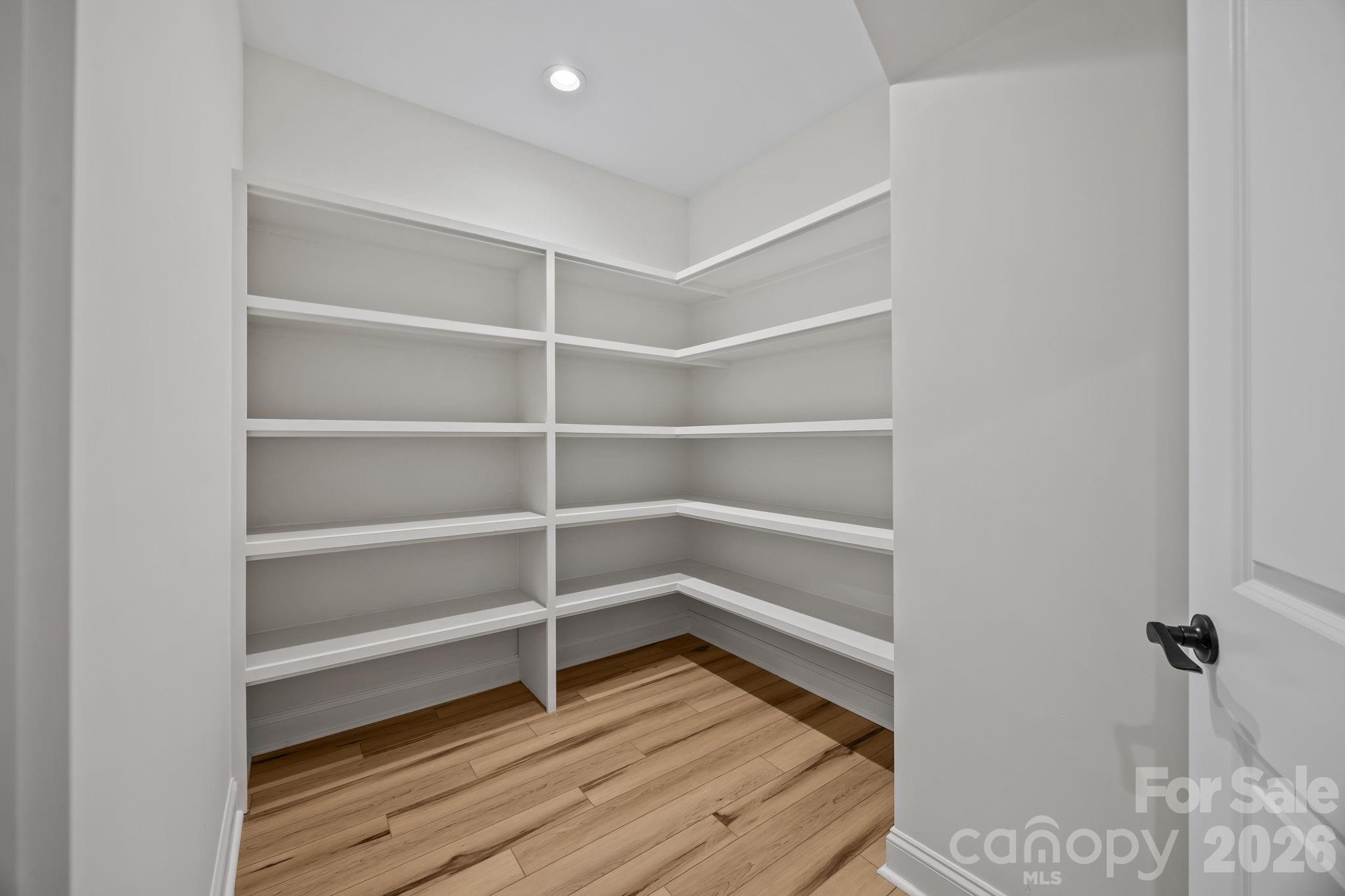 1030 Gibson Road Salisbury, NC 28147 - Photo 26 of 46 a view of walk in closet with empty racks