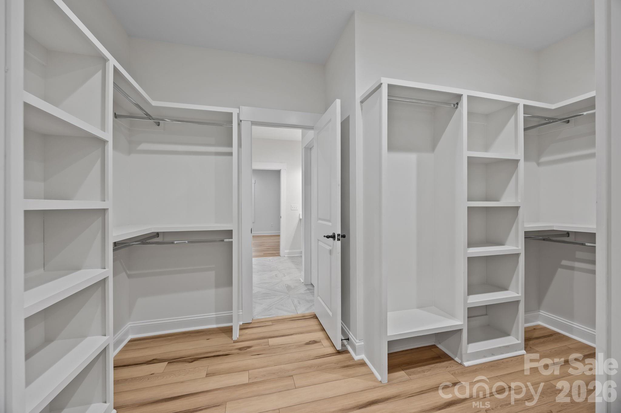 1030 Gibson Road Salisbury, NC 28147 - Photo 31 of 46 a view of walk in closet with empty racks