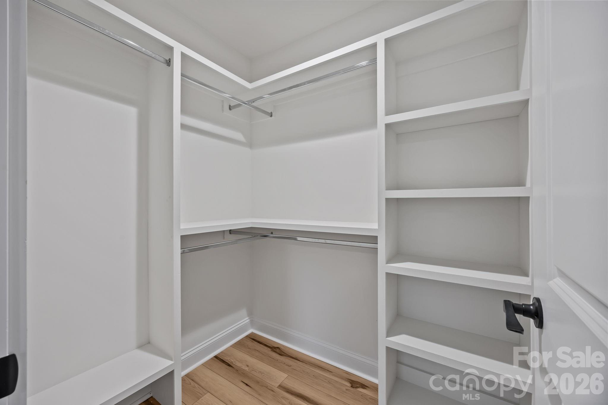 1030 Gibson Road Salisbury, NC 28147 - Photo 40 of 47 a view of walk in closet with empty racks