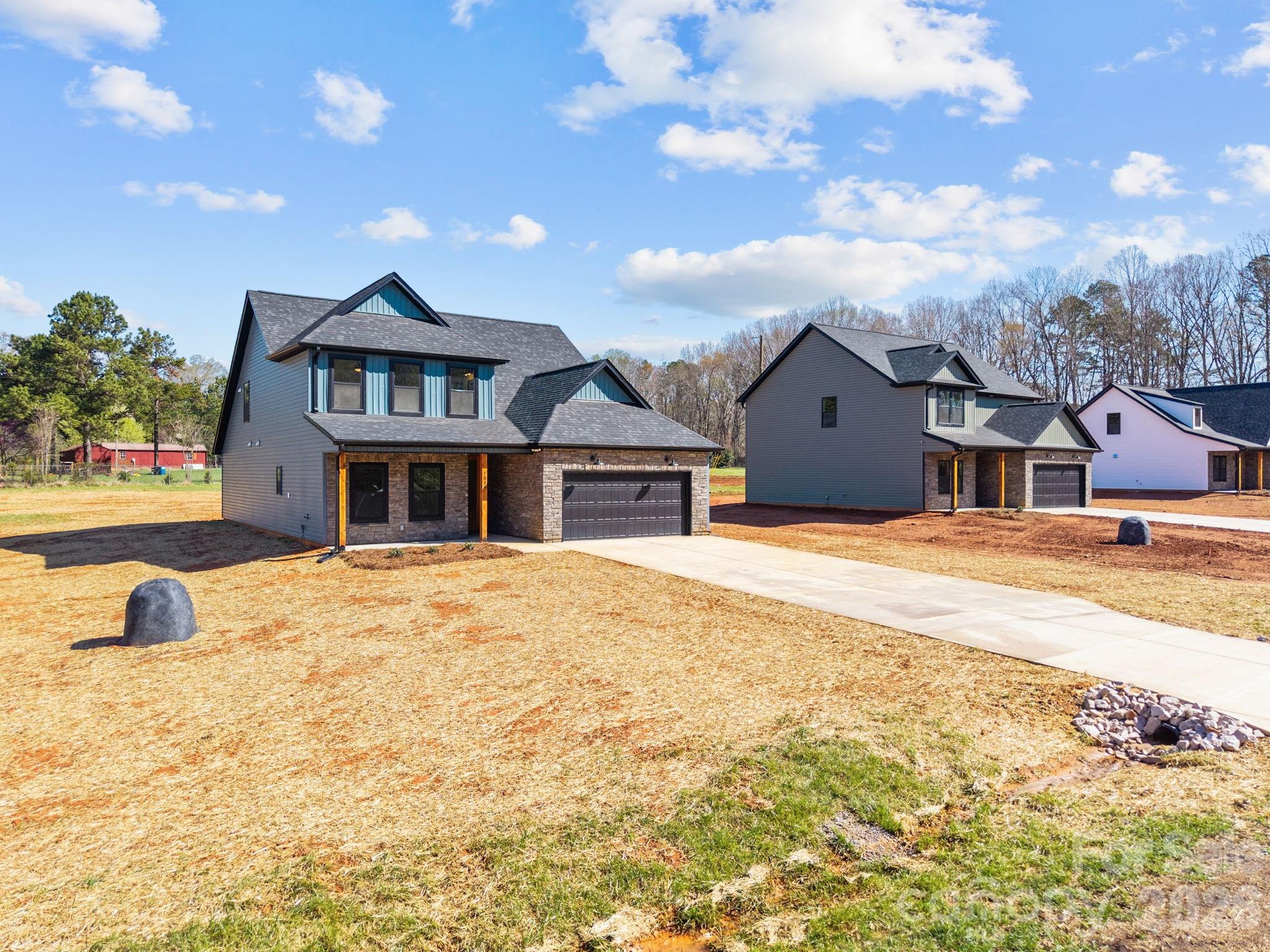 1030 Gibson Road Salisbury, NC 28147 - Photo 43 of 47 a front view of a house with a yard