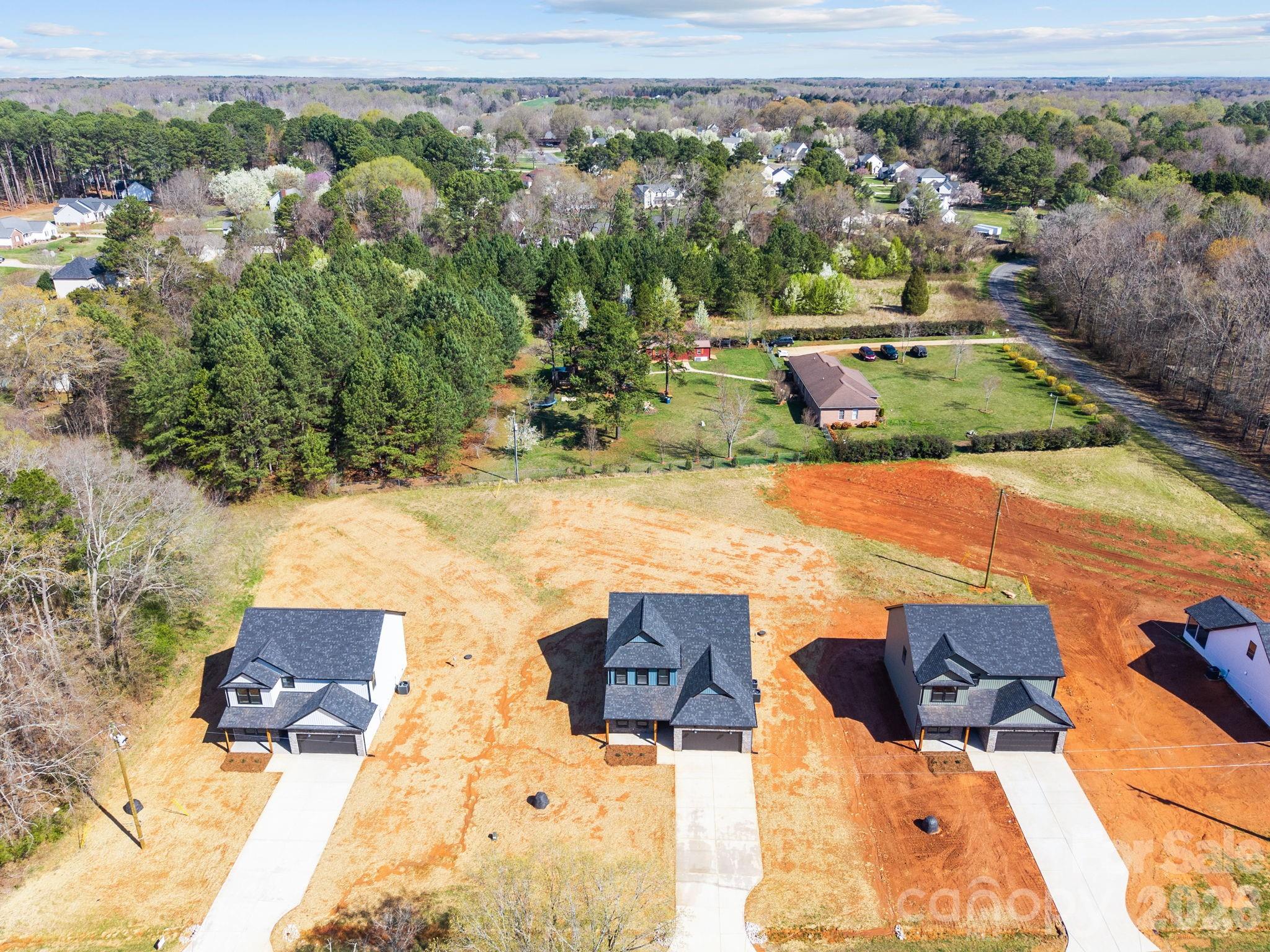 1030 Gibson Road Salisbury, NC 28147 - Photo 47 of 47 an aerial view of residential houses with outdoor space