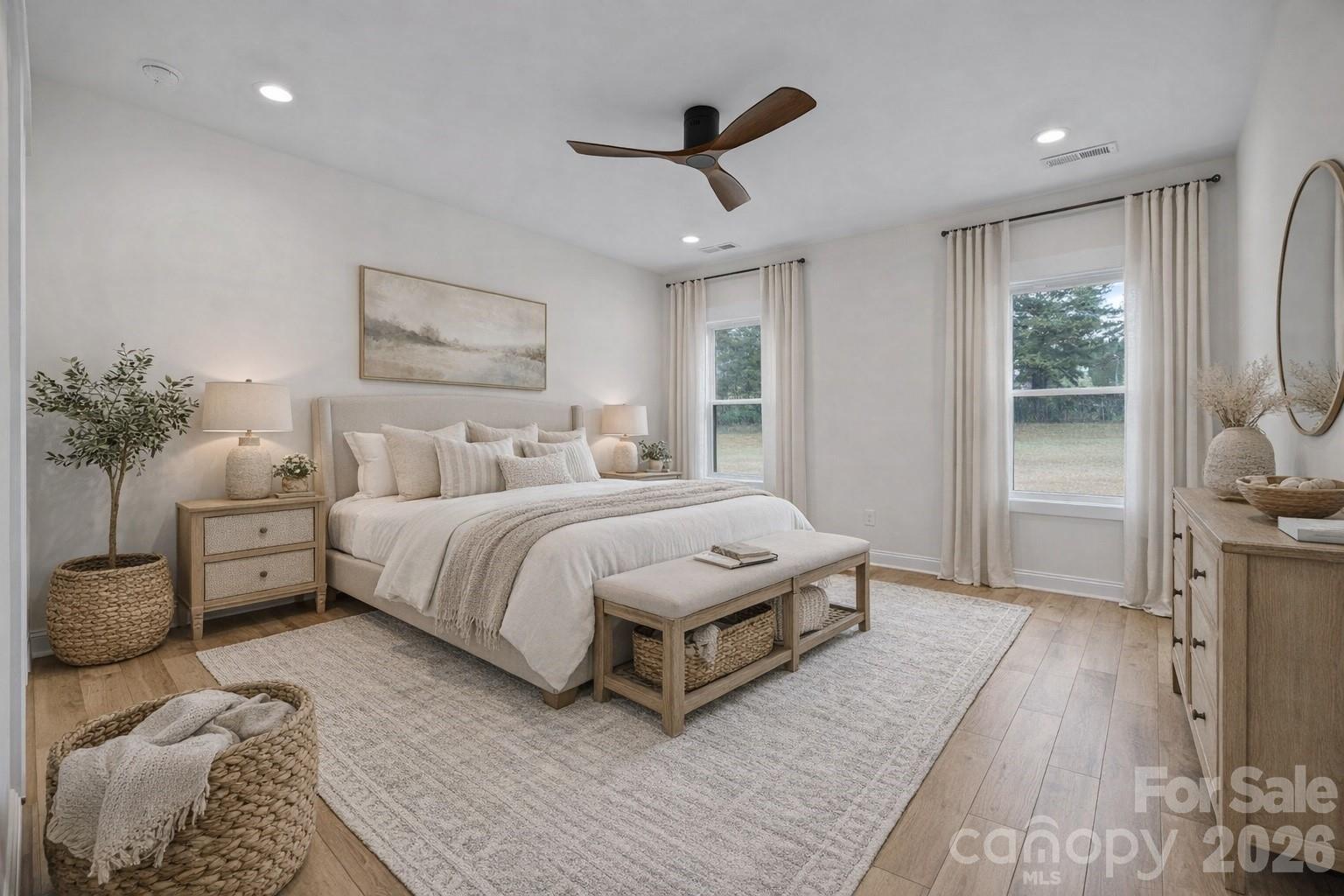 1030 Gibson Road Salisbury, NC 28147 - Photo 5 of 46 a spacious bedroom with a large bed and a chandelier