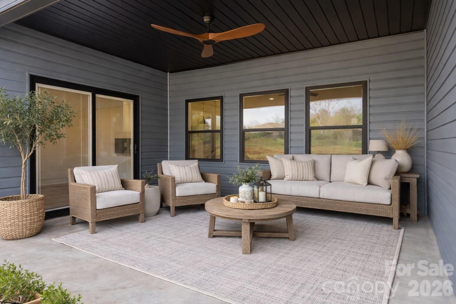 1030 Gibson Road Salisbury, NC 28147 - Photo 7 of 46 a living room with furniture and a large window