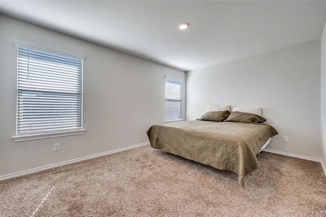 a view of a workspace with furniture