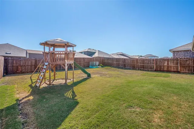a view of a house with a swimming pool