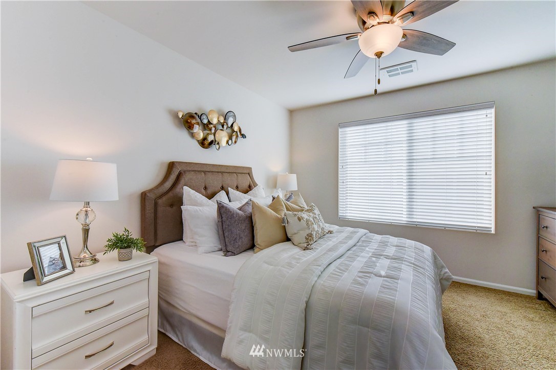 3010 34th Place Everett, WA 98201 - Photo 11 of 39 a bedroom with a bed and a window