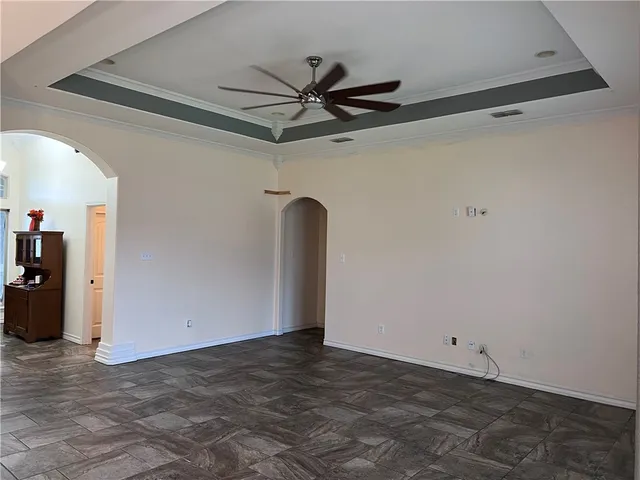 a view of an empty room and window