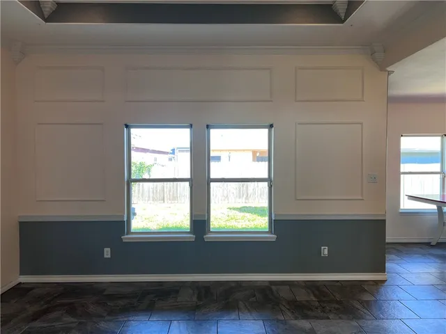 a living room with kitchen island furniture and a window