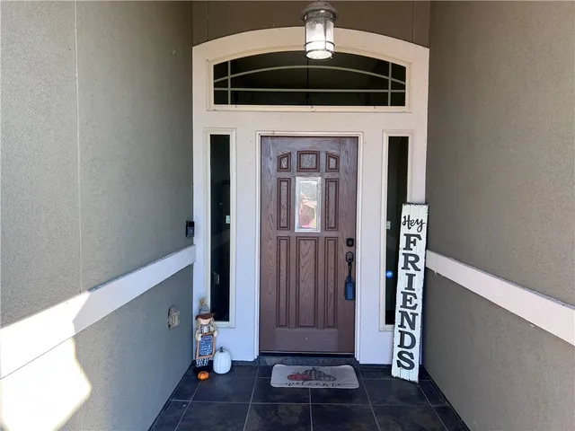 a view of a hallway with entryway