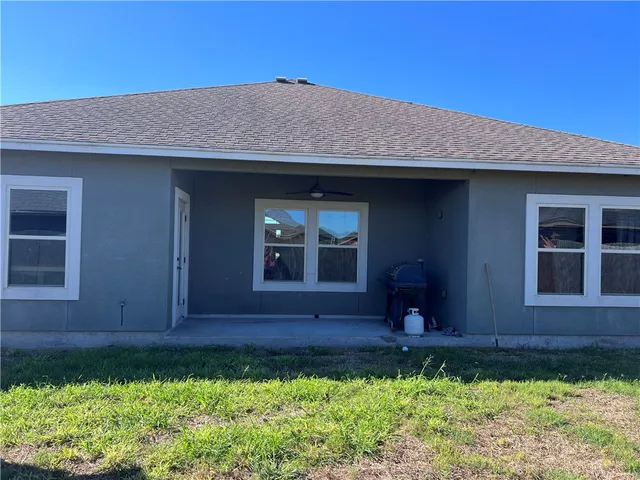 a front view of a house with yard