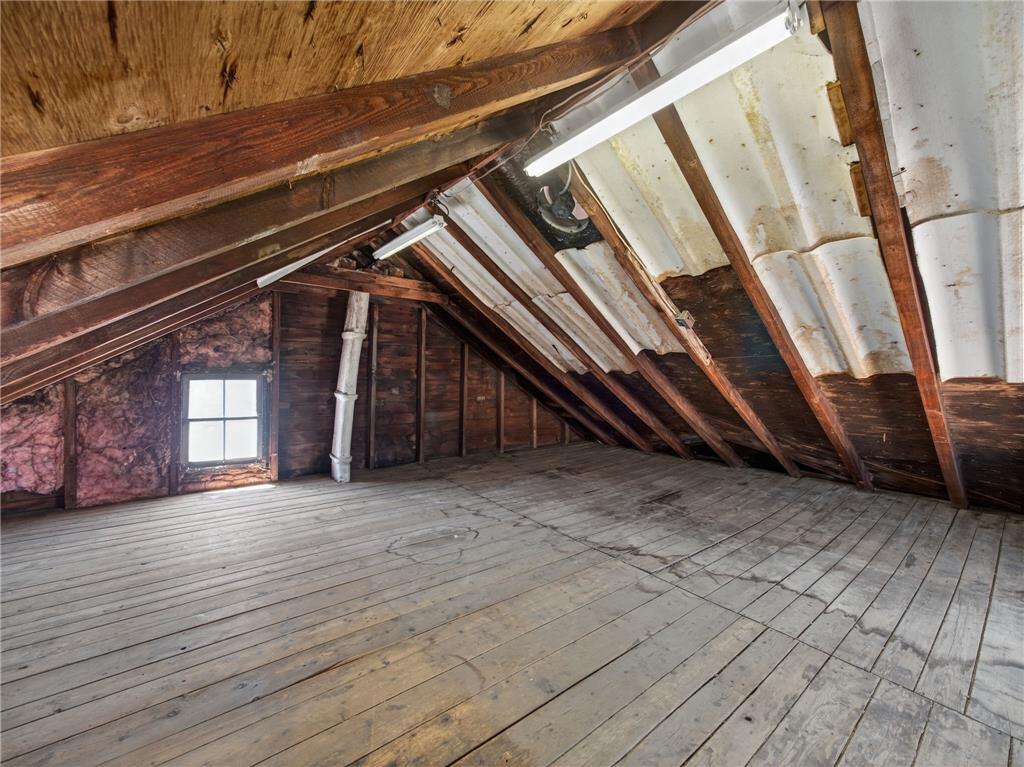 15845 Kutztown Road Mertztown, PA 19539 - Photo 14 of 24 Unfinished attic space offers ample storage with exposed beams and a window for natural light.