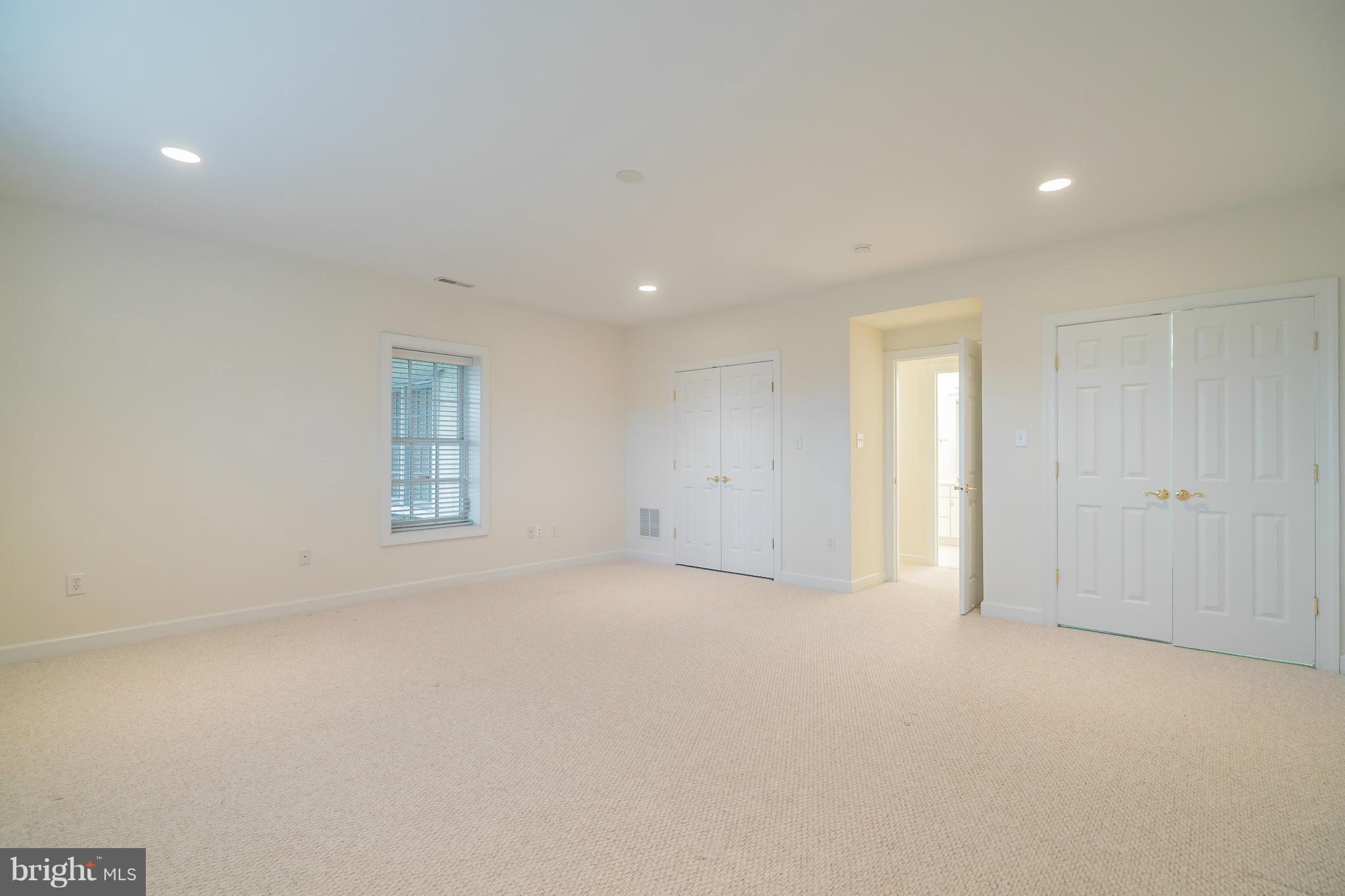 9504 Emory Grove Road Gaithersburg, MD 20877 - Photo 26 of 30 a view of an empty room with a window