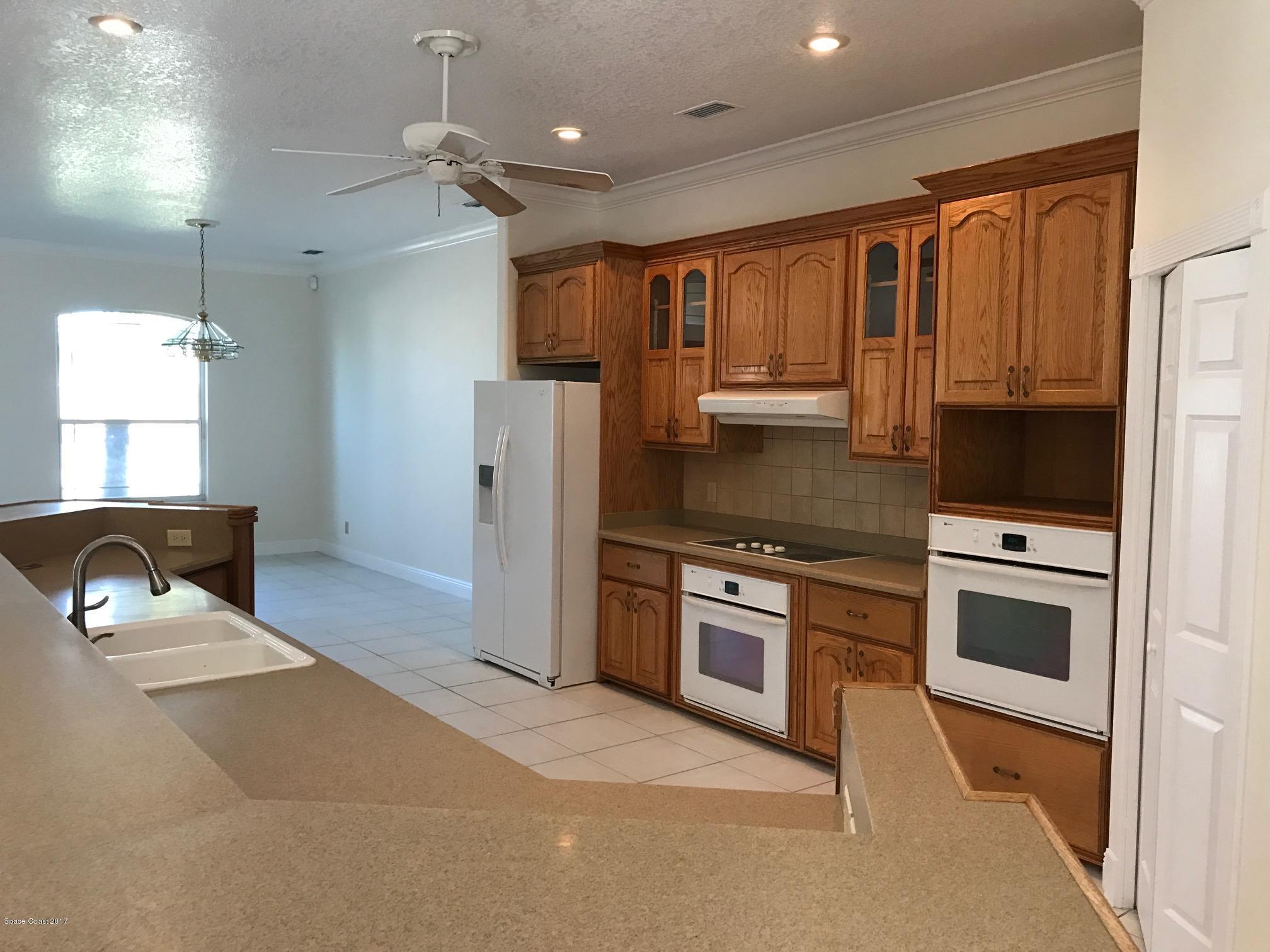 401 Rio Villa Boulevard Melbourne, FL 32903 - Photo 4 of 19 countertop to kitchen