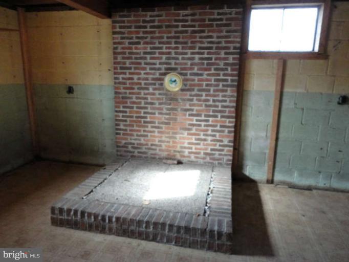 10170 Berry Road Waldorf, MD 20603 - Photo 16 of 28 Slab for a free standing wood/pellet stove