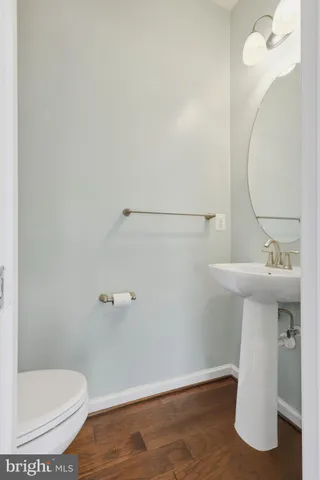 a bathroom with a sink and toilet