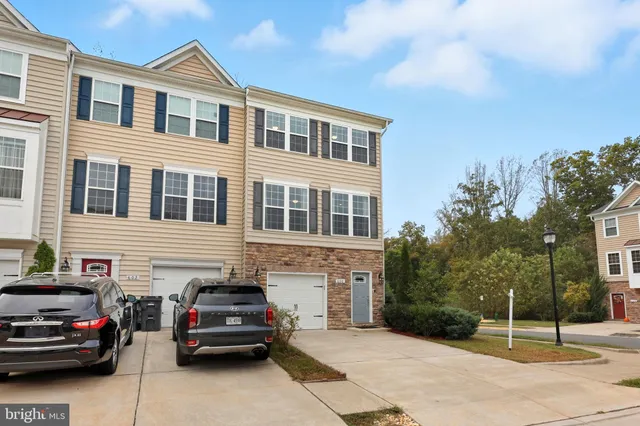 a view of a car parked in front of a building