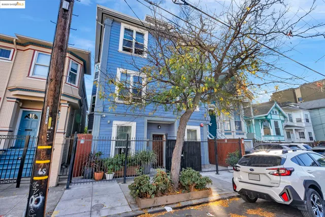 a car parked in front of brick building