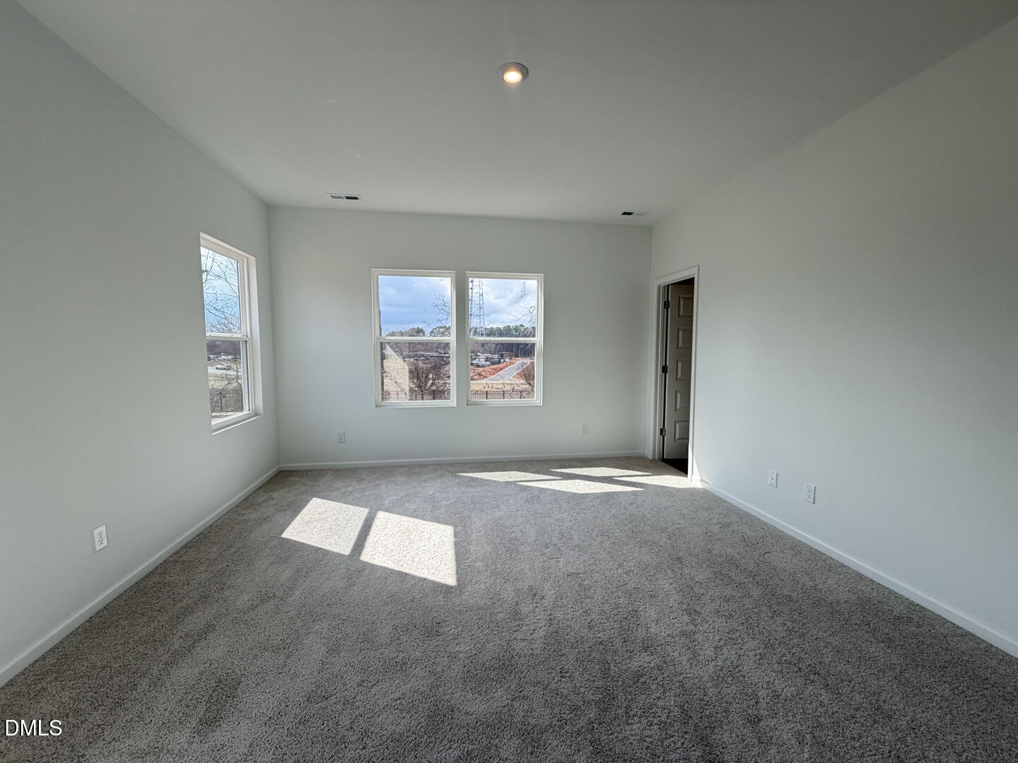 3328 Bomore Road Raleigh, NC 27610 - Photo 26 of 47 an empty room with windows and windows