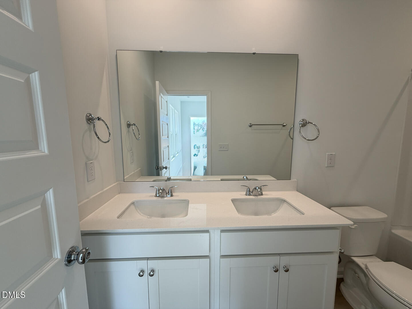 3328 Bomore Road Raleigh, NC 27610 - Photo 28 of 47 a bathroom with a sink and a mirror