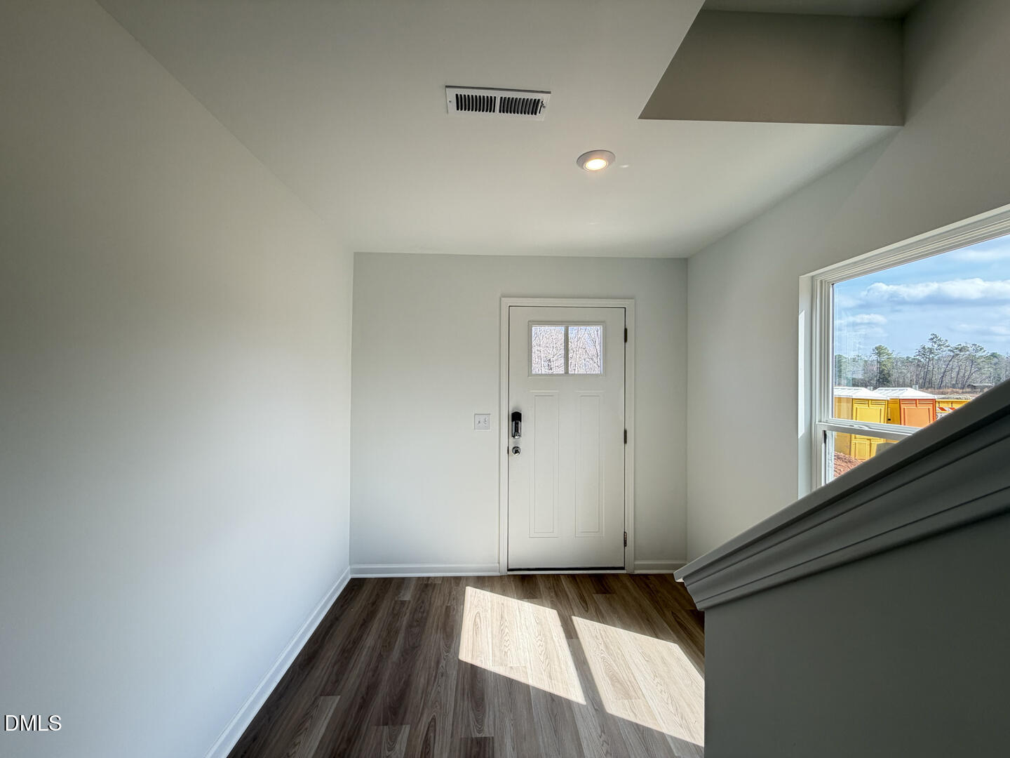3328 Bomore Road Raleigh, NC 27610 - Photo 3 of 47 a view of an empty room and window