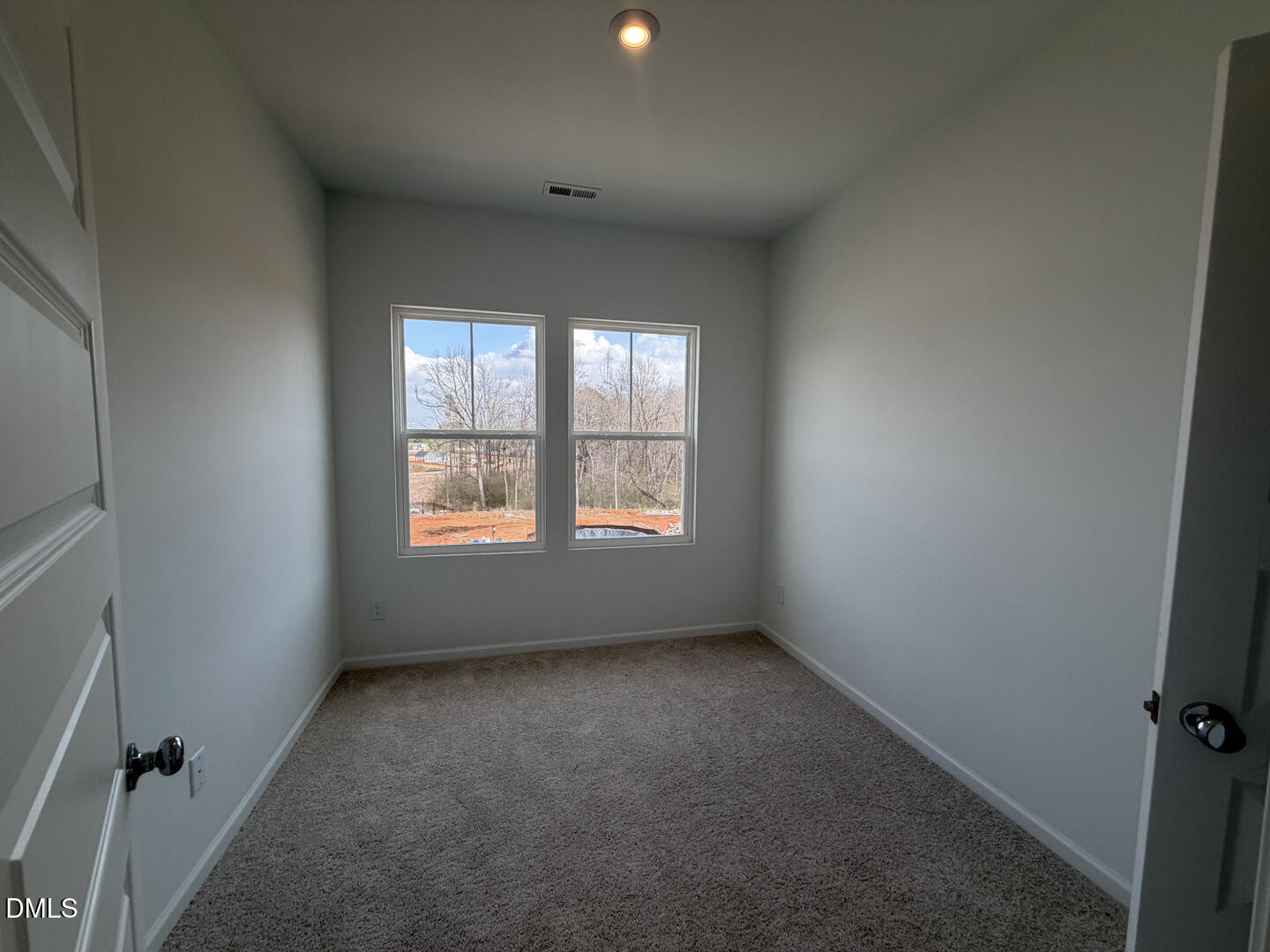 3328 Bomore Road Raleigh, NC 27610 - Photo 40 of 47 an empty room with windows