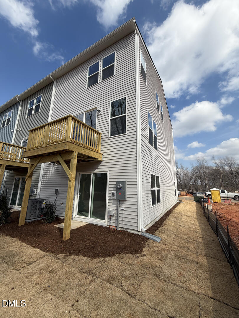 3328 Bomore Road Raleigh, NC 27610 - Photo 43 of 47 a front view of a house with a yard and garage
