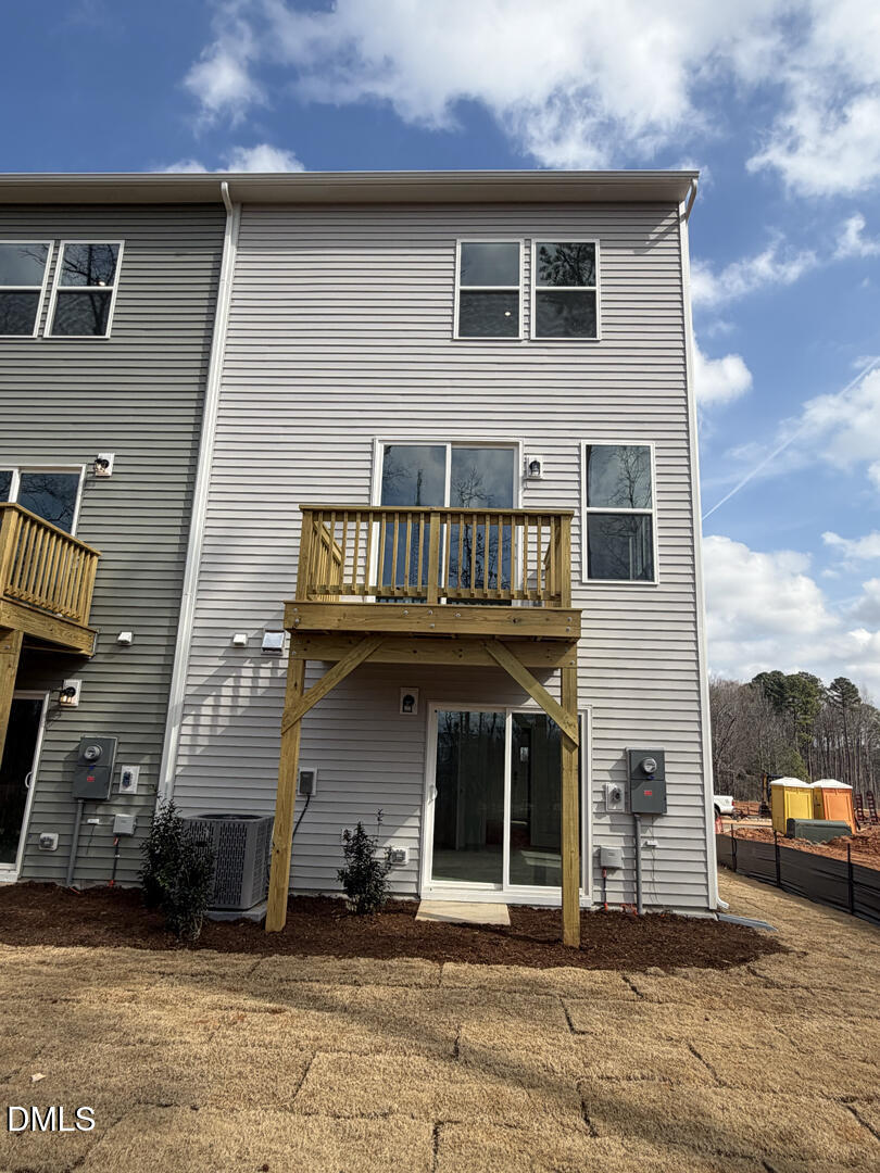 3328 Bomore Road Raleigh, NC 27610 - Photo 45 of 47 a front view of a house with a parking space