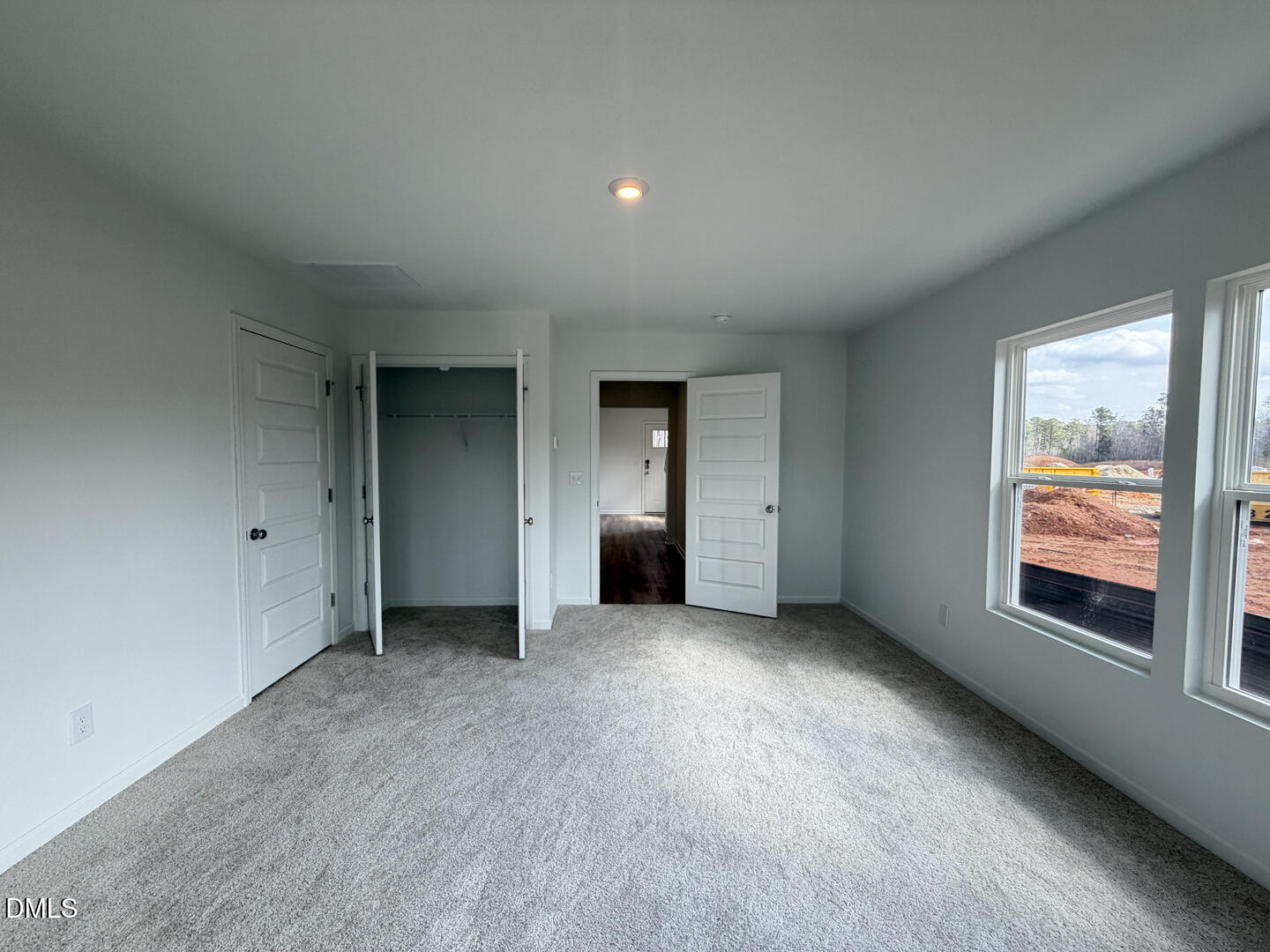 3328 Bomore Road Raleigh, NC 27610 - Photo 6 of 47 an empty room with windows and closet