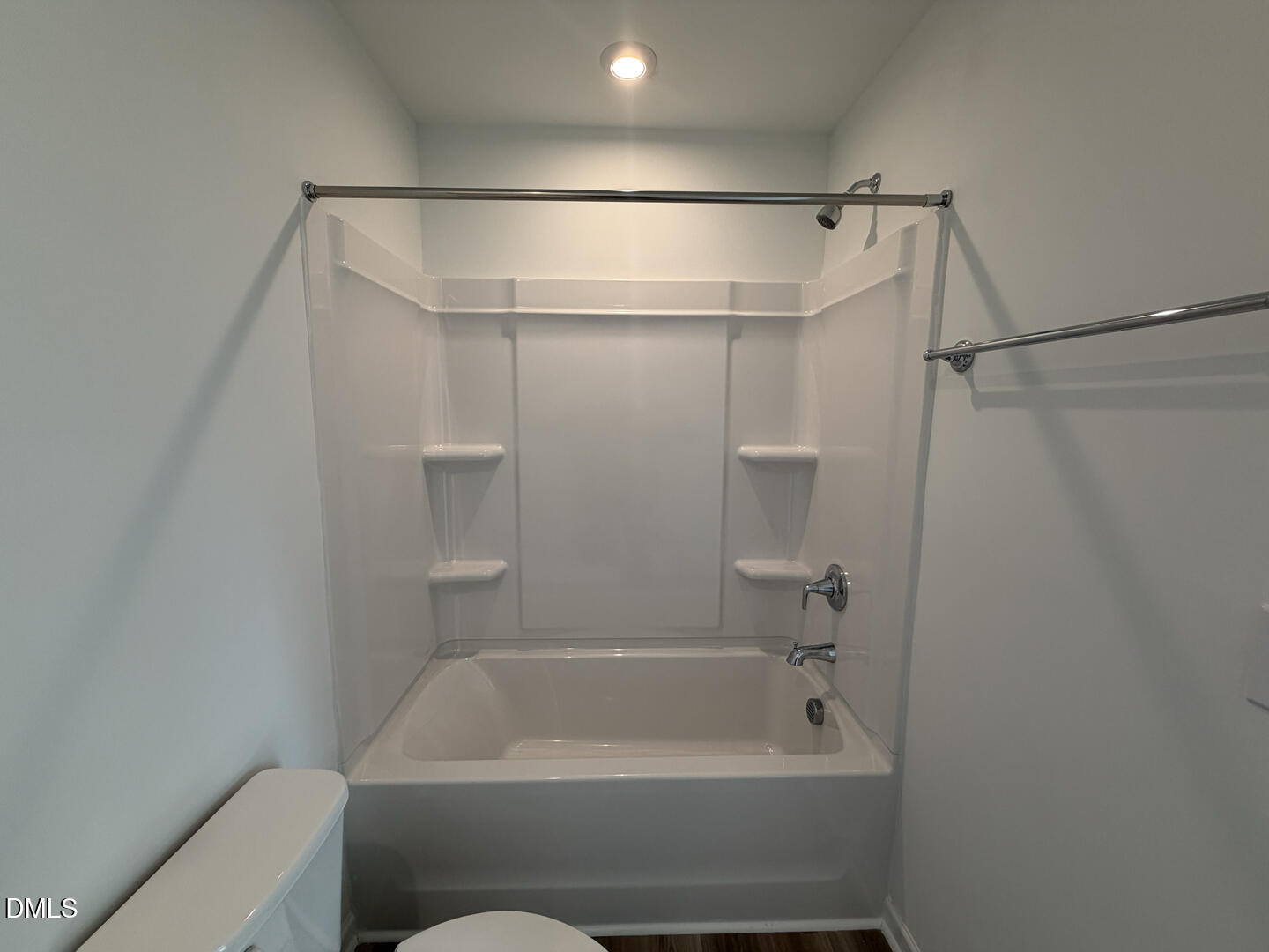 3328 Bomore Road Raleigh, NC 27610 - Photo 10 of 47 a bathroom with a shower and a bath tub