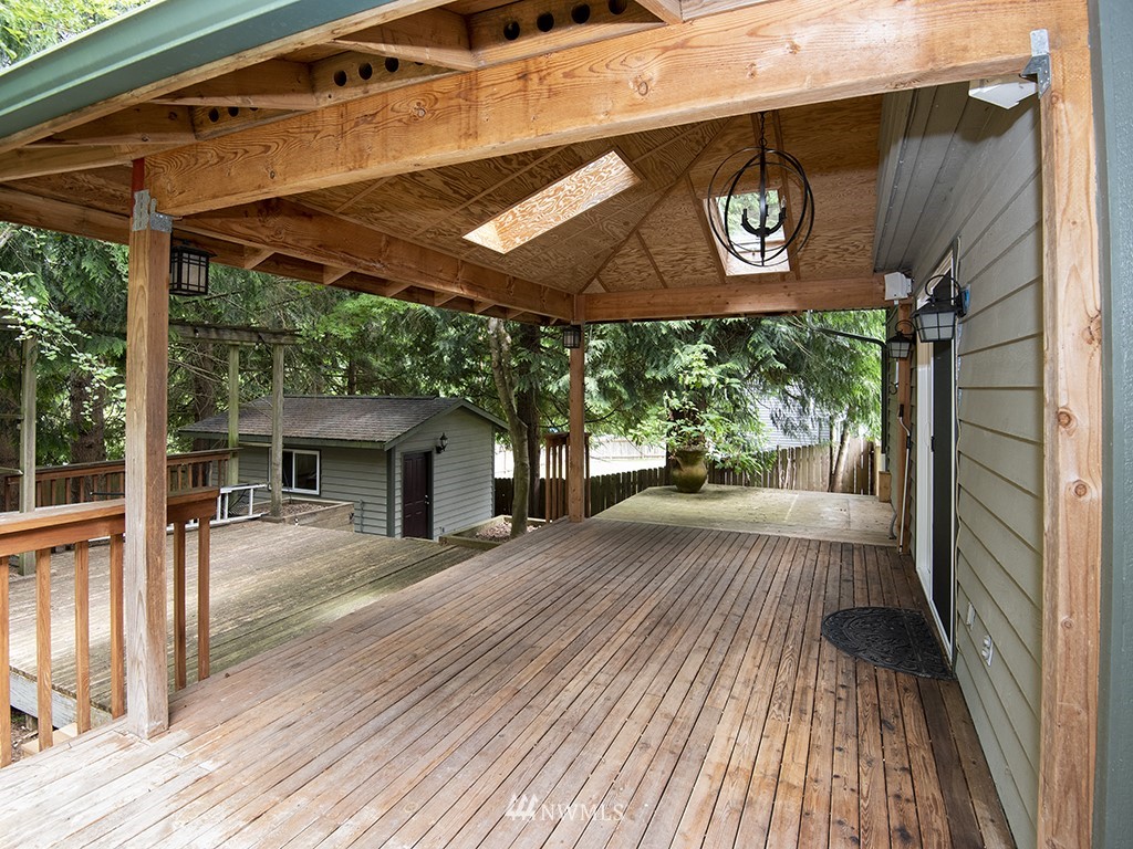 21922 Southeast 255th Place Maple Valley, WA 98038 - Photo 27 of 40 a view of a backyard with sitting area