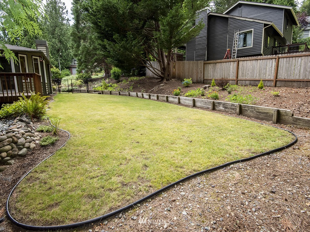 21922 Southeast 255th Place Maple Valley, WA 98038 - Photo 29 of 40 a view of a swimming pool with chairs