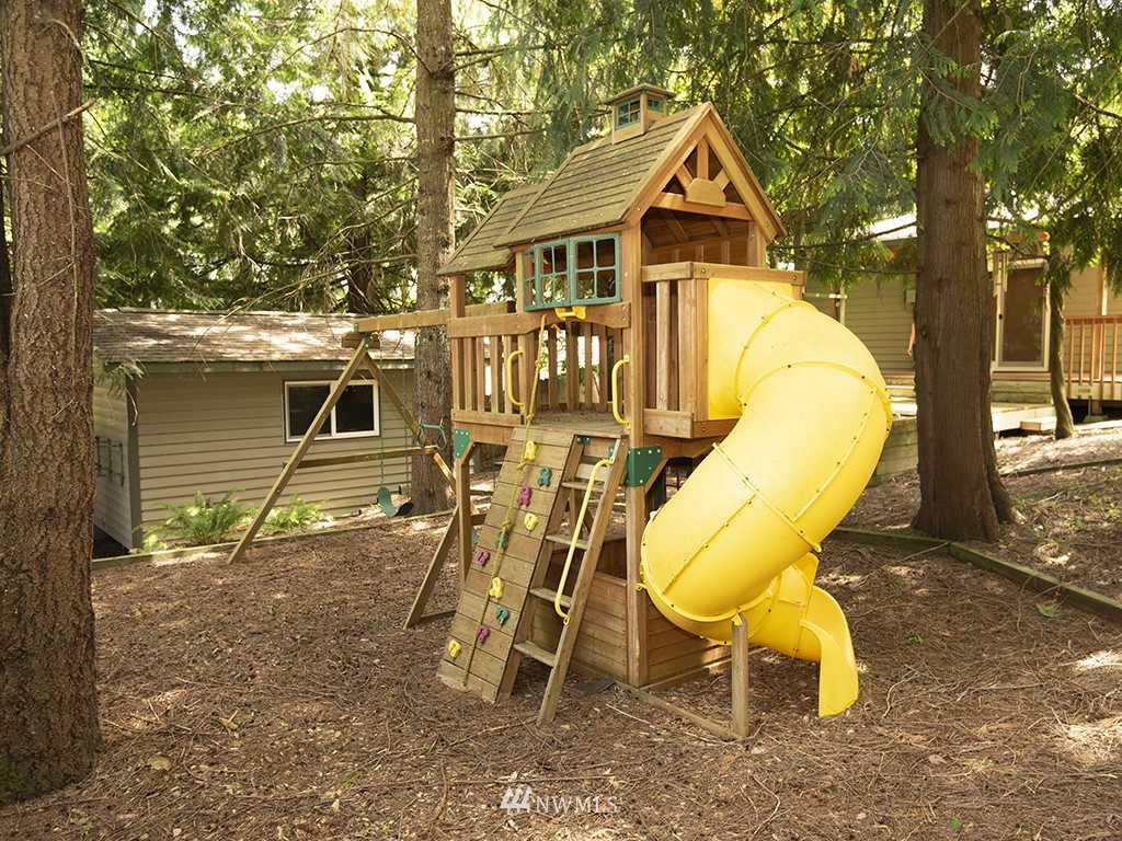 21922 Southeast 255th Place Maple Valley, WA 98038 - Photo 36 of 40 a view of a house with a yard