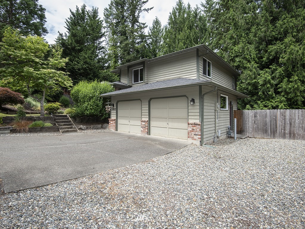 21922 Southeast 255th Place Maple Valley, WA 98038 - Photo 40 of 40 a house with a outdoor space