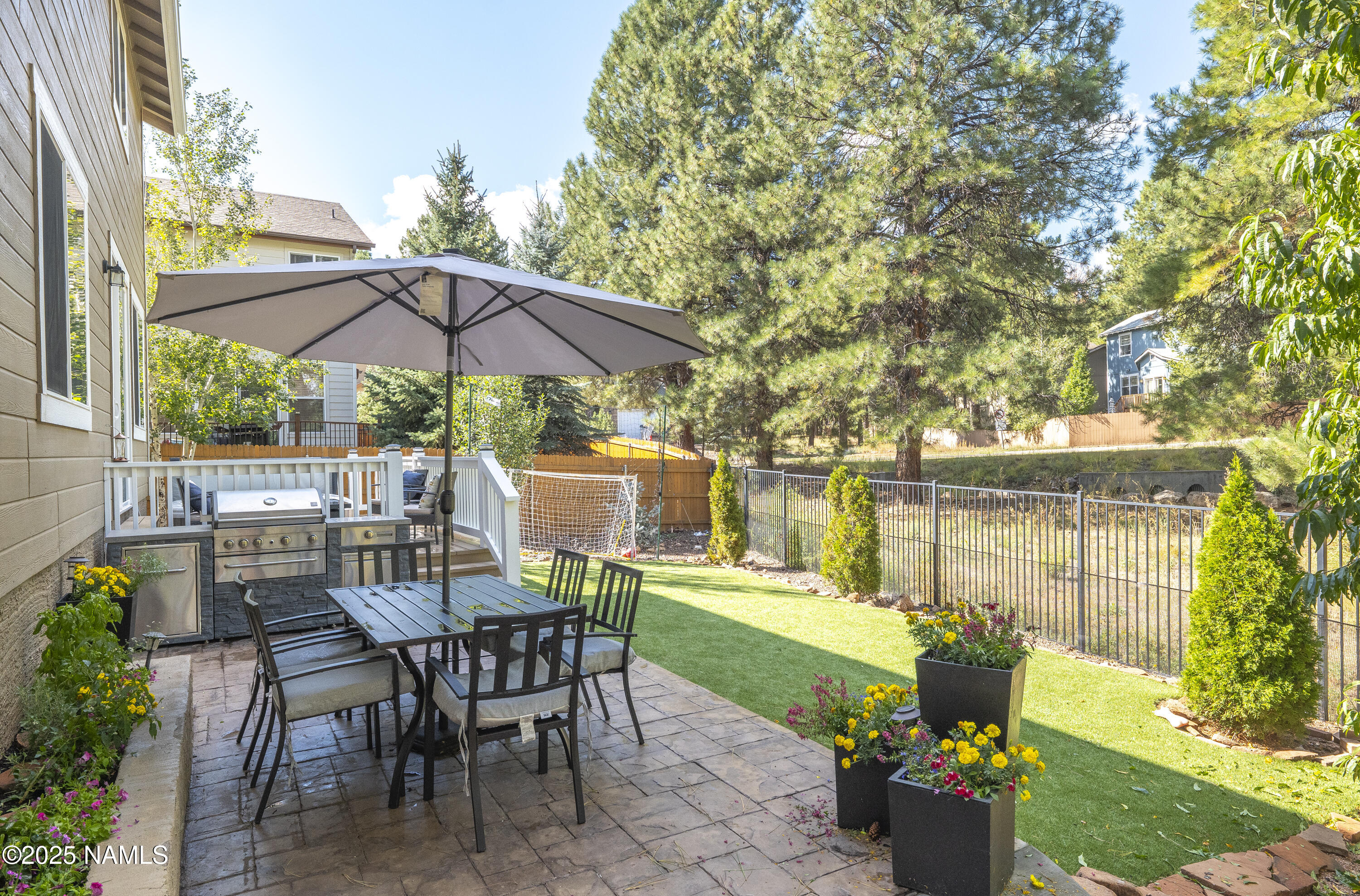 5053 South Topaz Road Flagstaff, AZ 86005 - Photo 20 of 25 a view of a backyard with sitting area and furniture