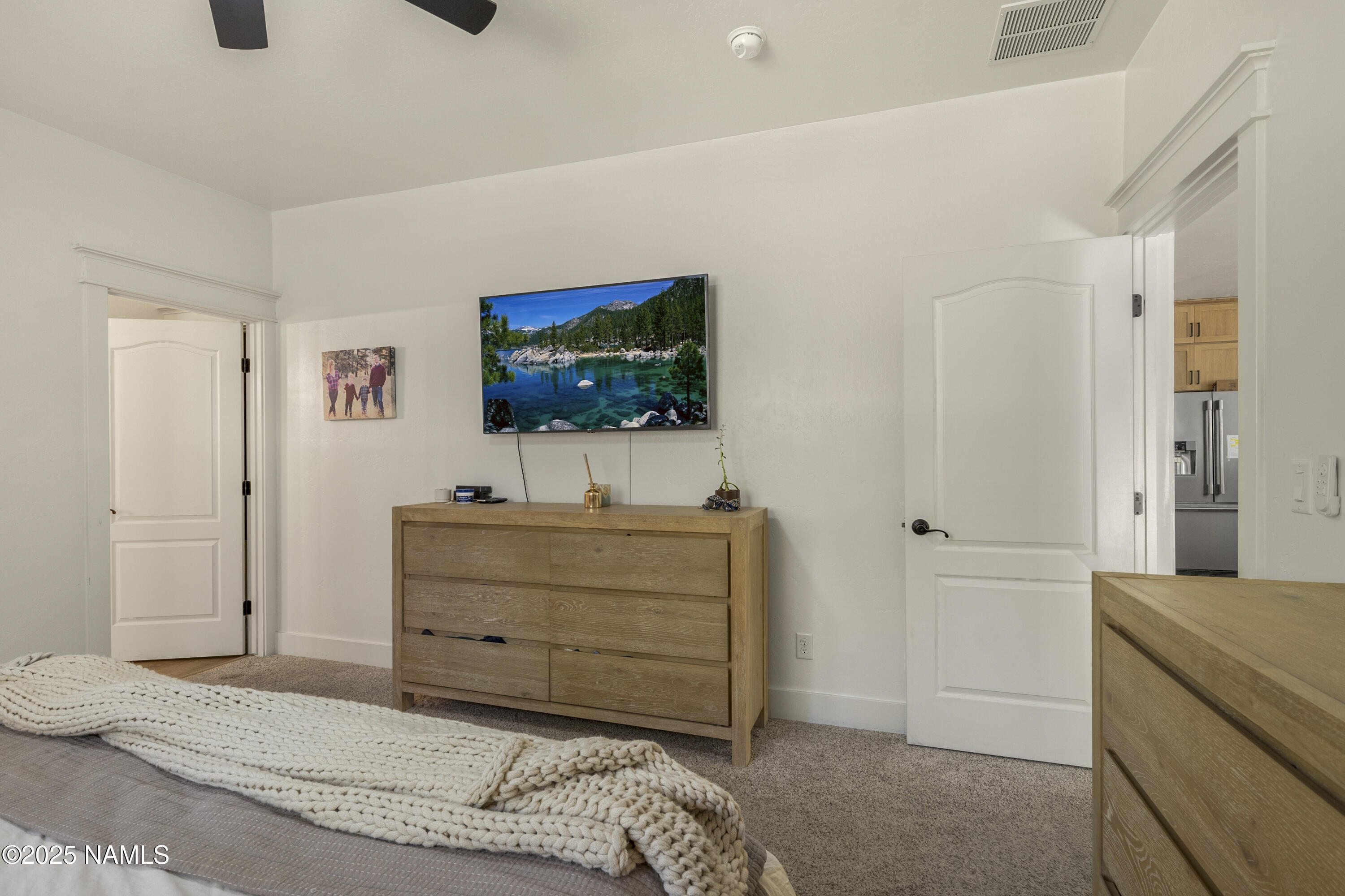 5053 South Topaz Road Flagstaff, AZ 86005 - Photo 10 of 25 a living room with furniture and a flat screen tv