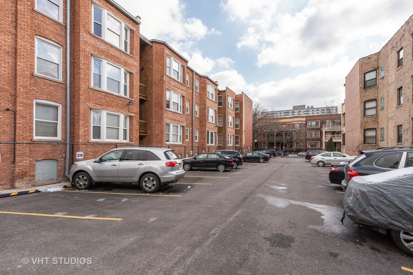 834 West Lakeside Place, Unit 2N Chicago, IL 60640 - Photo 12 of 13 a view of street with parked cars