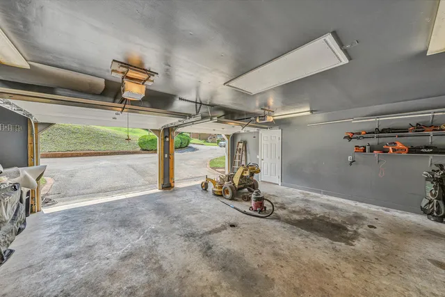 a view of a garage with wooden floor