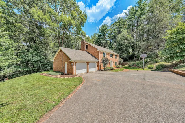 a house with trees in front of it