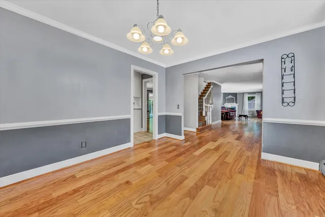 a view of a livingroom with wooden floor