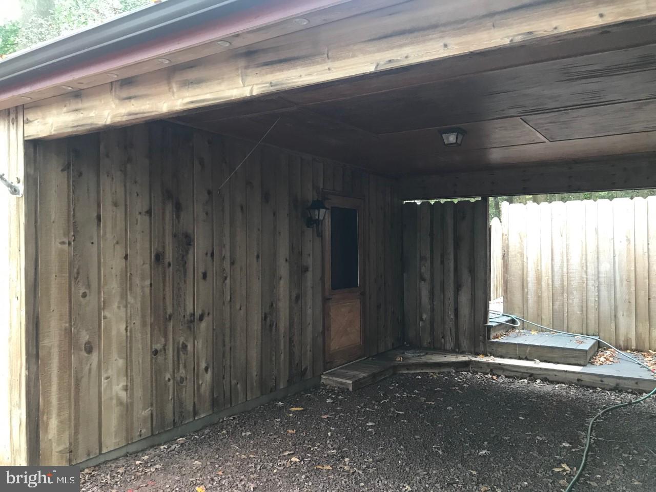 15376 Hudson Road Milton, DE 19968 - Photo 16 of 67 carport with additional storage
