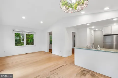 a view of a kitchen and a window