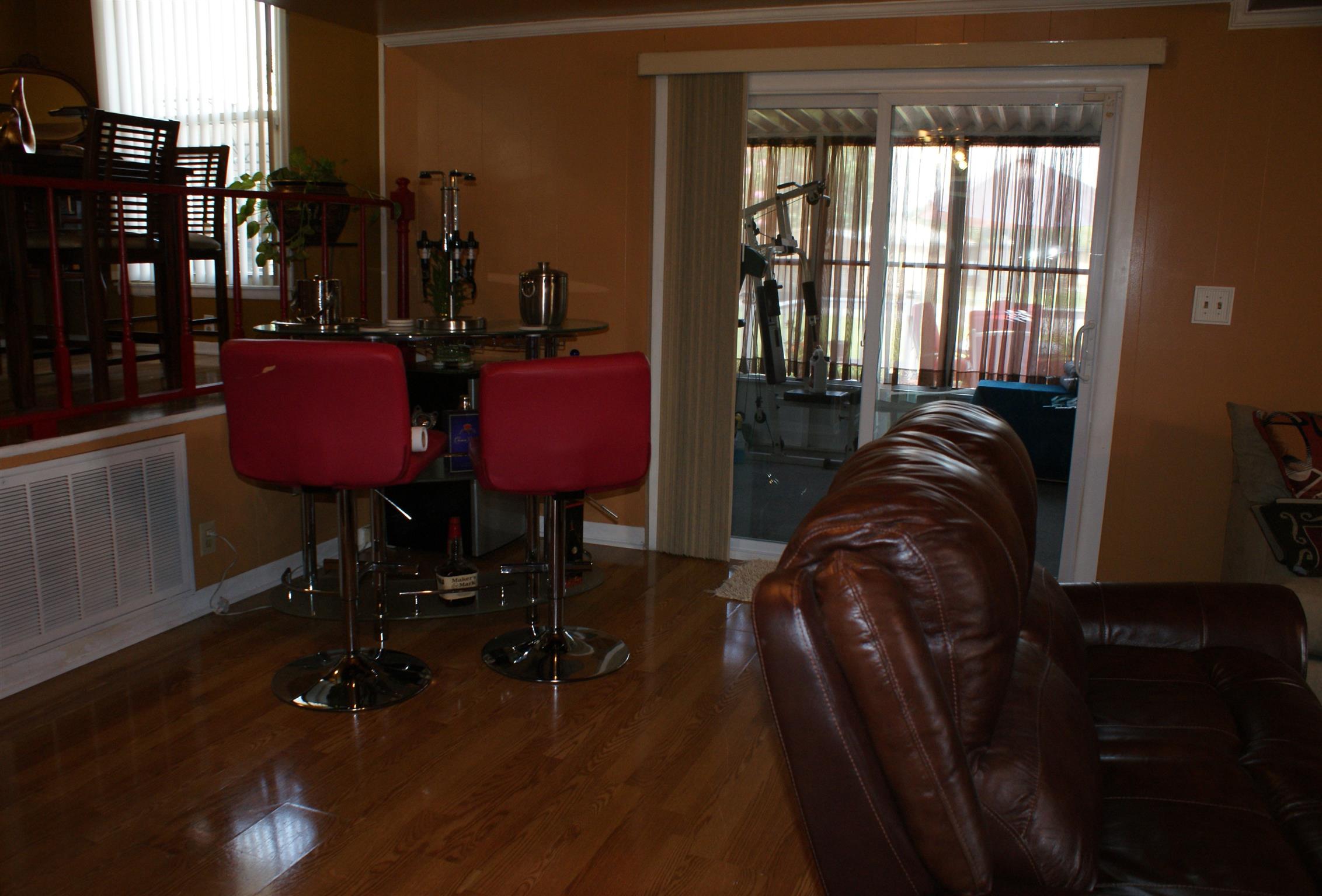 280 Bell Road Nashville, TN 37217 - Photo 13 of 22 The den area has space for your own beverage center and is convenient to the kitchen and dining area.