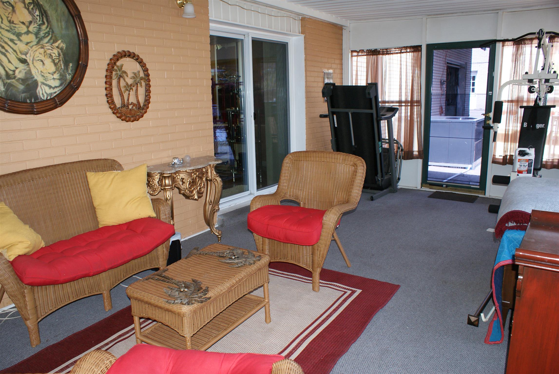 280 Bell Road Nashville, TN 37217 - Photo 16 of 22 Another view of the sunroom. Sliding doors lead into the den, while the other takes you to the deck.