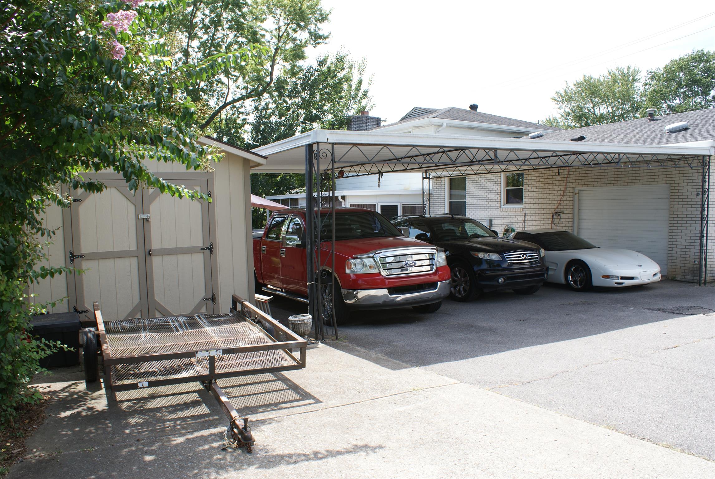 280 Bell Road Nashville, TN 37217 - Photo 21 of 22 The carport has room for 3 cars or choose to use the garage.