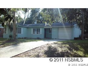1502 South Riverside Drive New Smyrna Beach, FL 32168 - Photo 1 of 1 a black and white photo of a house