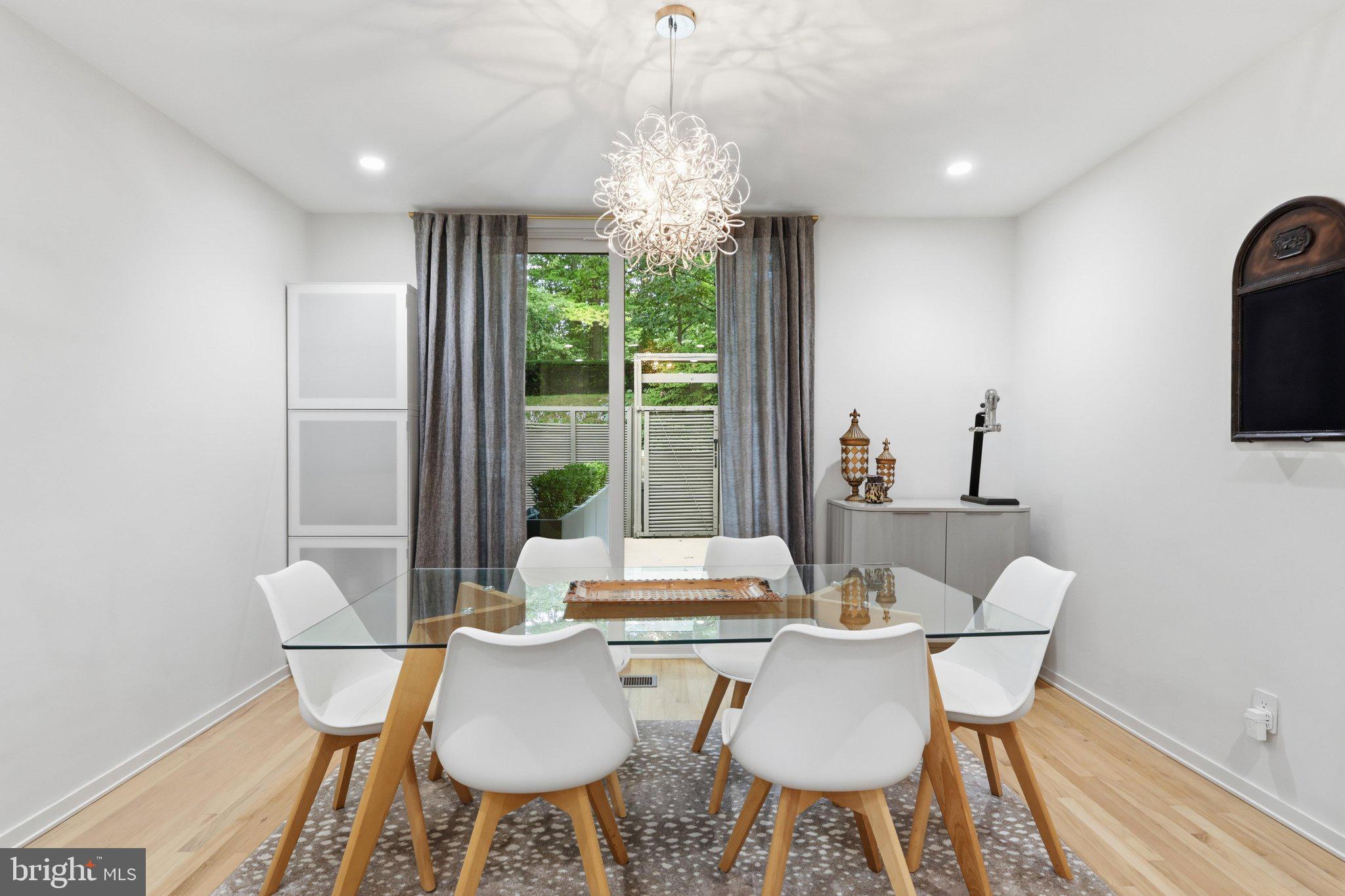1676 Chimney House Road Reston, VA 20190 - Photo 8 of 56 Dining Room - NEW Slider with Auto Shade